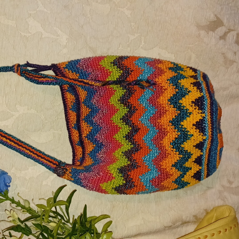Woven crossbody bag.